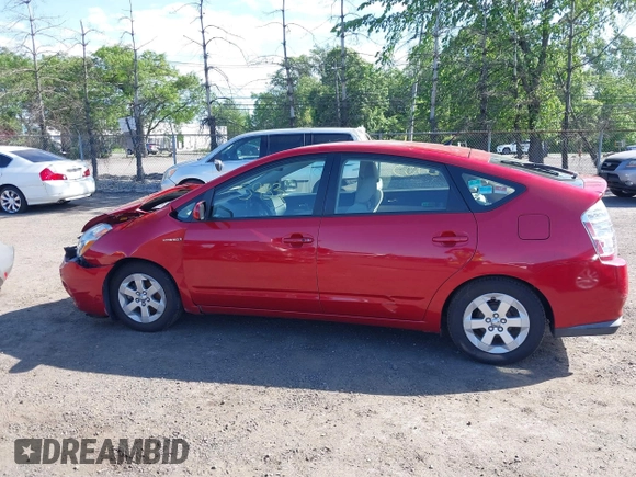 2007 Toyota Prius z VIN JTDKB20U577558459, wystawiony jako IAAI lot #42265933 z przebiegiem 104 286 mil mil oraz . Historia ofert i sprzedaży dostępna na DreamBid. Obrazek 14.