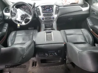 2015 GMC Yukon XL SLT with VIN 1GKS2HKC8FR616031, listed as a Copart auction lot 48740785 with 128,467 mi miles and Salvage Title. Bid and sale history available at carsss.com. Image 8.