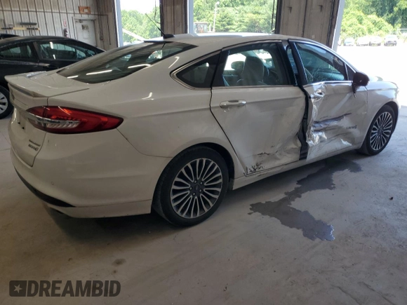 2017 Ford Fusion Hybrid Titanium z VIN 3FA6P0RU3HR400034, wystawiony jako Copart lot #62689795 z przebiegiem 109 118 mil mil oraz Szkoda całkowita • Salvage title. Historia ofert i sprzedaży dostępna na DreamBid. Obrazek 3.