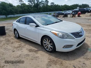 2013 Hyundai Azera z VIN KMHFH4JG4DA214345, wystawiony jako Copart lot #57491015 z przebiegiem 178 722 mil mil oraz Czysty tytuł • Clean title. Historia ofert i sprzedaży dostępna na DreamBid. Obrazek 5.