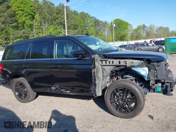 2022 Ford Expedition XLT with VIN 1FMJU1JT7NEA28536, listed as a IAAI auction lot 42062746 with 47,888 mi miles and . Bid and sale history available at DreamBid. Image 14.