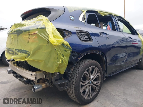 2018 BMW X2 sDrive28i z VIN WBXYJ3C31JEP76135, wystawiony jako IAAI lot #42136753 z przebiegiem 21 377 mil mil oraz . Historia ofert i sprzedaży dostępna na DreamBid. Obrazek 6.