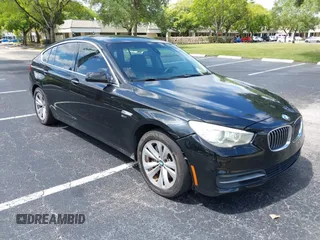 2011 BMW 5 Series GT 535i xDrive with VIN WBASP2C50BC337015, listed as a IAAI auction lot 42209500 with 136,961 mi miles. Bid and sale history available at carsss.com. Image 1.