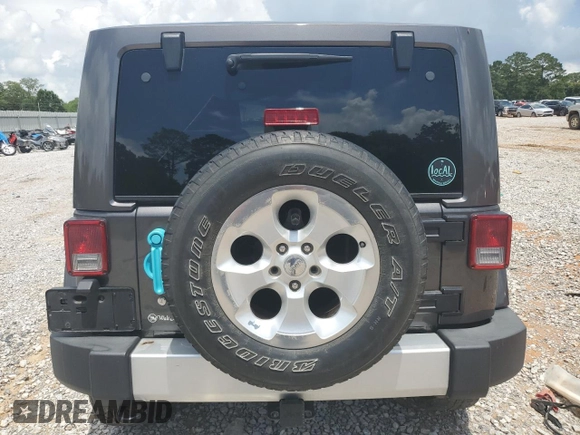 2014 Jeep Wrangler Sahara with VIN 1C4AJWBG8EL248291, listed as a Copart auction lot 60611345 with 84,777 mi miles and Salvage title. Bid and sale history available at DreamBid. Image 6.