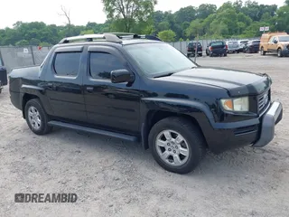 2007 Honda Ridgeline RTL with VIN 2HJYK16557H504664, listed as a IAAI auction lot 42488384 with 206,735 mi miles and . Bid and sale history available at DreamBid. Image 1.