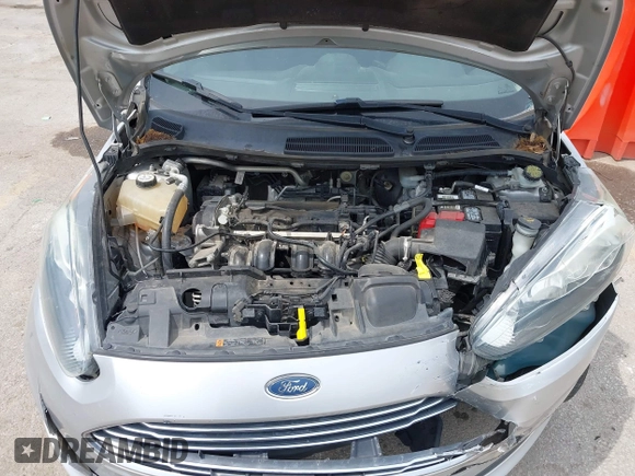 2018 Ford Fiesta SE z VIN 3FADP4BJ6JM106855, wystawiony jako IAAI lot #42491262 z przebiegiem 166 397 mil mil oraz . Historia ofert i sprzedaży dostępna na DreamBid. Obrazek 10.