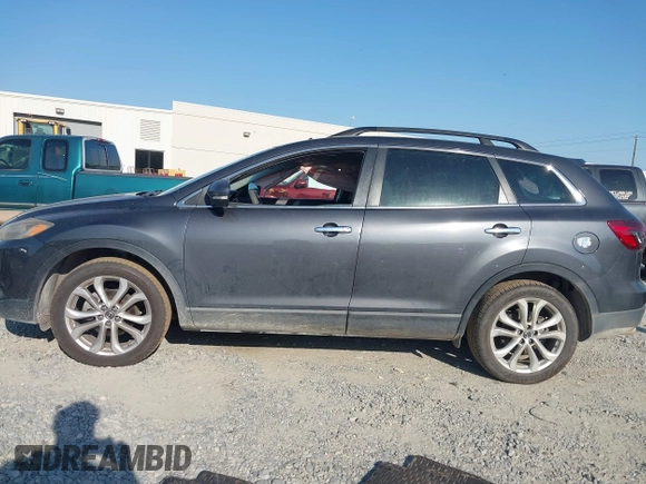 2013 Mazda CX-9 Grand Touring z VIN JM3TB2DA6D0424124, wystawiony jako IAAI lot #42032588 z przebiegiem 151 569 mil mil oraz . Historia ofert i sprzedaży dostępna na DreamBid. Obrazek 14.