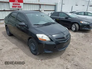 2007 Toyota Yaris with VIN JTDBT923271080059, listed as a IAAI auction lot 42142312 with 1 mi miles. Bid and sale history available at carsss.com. Image 1.