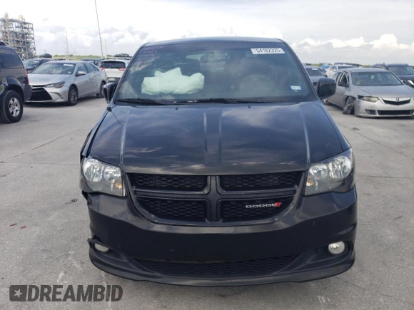 2018 Dodge Grand Caravan SE Plus with VIN 2C4RDGBG2JR199767, listed as a Copart auction lot 54182325 with 137,522 mi miles and Salvage Title. Bid and sale history available at DreamBid. Image 5.
