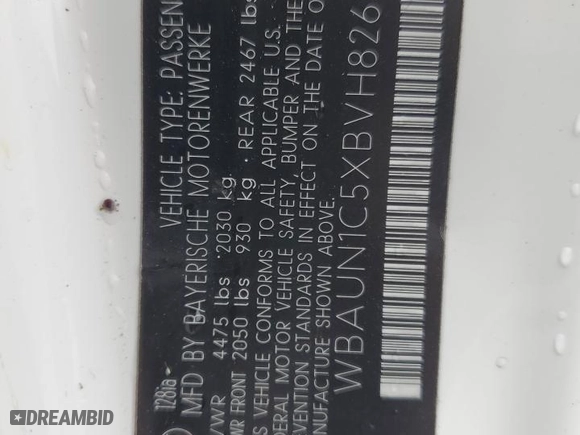 2011 BMW 1 Series 128i with VIN WBAUN1C5XBVH82605, listed as a Copart auction lot 73457334 with 94,969 mi miles and Salvage Title. Bid and sale history available at carsss.com. Image 12.