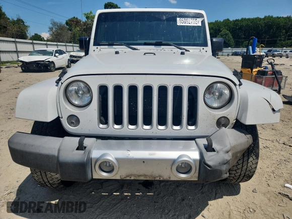 2016 Jeep Wrangler Unlimited Sahara с VIN 1C4HJWEG3GL346528, выставлен на аукционе Copart как лот 65092755 с пробегом 127 393 миль миль и Списание • Salvage title. История ставок и продаж доступна на DreamBid. Изображение 5.