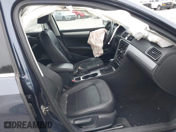 2013 Volkswagen Passat SE z VIN 1VWBP7A37DC145575, wystawiony jako IAAI lot #41253095 z przebiegiem 93 702 mil mil oraz . Historia ofert i sprzedaży dostępna na DreamBid. Obrazek 5.