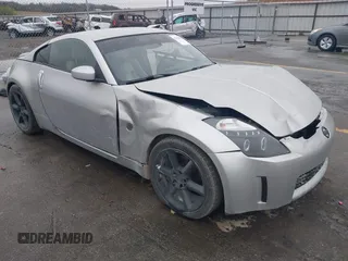 2003 Nissan 350Z Touring z VIN JN1AZ34E43T014247, wystawiony jako IAAI lot #42120812 z przebiegiem 112 263 mil mil oraz . Historia ofert i sprzedaży dostępna na DreamBid. Obrazek 1.