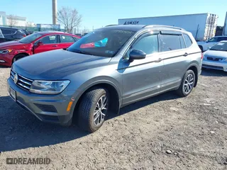 2020 Volkswagen Tiguan SE with VIN 3VV2B7AX8LM119358, listed as a IAAI auction lot 41897534 with 131,646 mi miles. Bid and sale history available at carsss.com. Image 2.