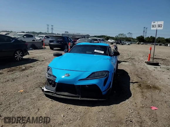 2021 Toyota Supra 2.0 with VIN WZ1DB2C04MW039858, listed as a Copart auction lot 70049874 with 10,586 mi miles and Salvage title. Bid and sale history available at DreamBid. Image 14.
