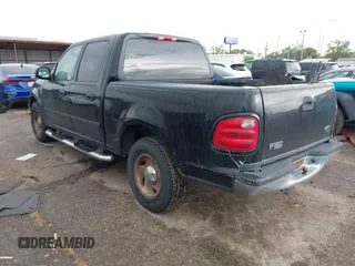 2003 Ford F-150 XLT with VIN 1FTRW07623KD67409, listed as a IAAI auction lot 41912067 with Not Provided miles. Bid and sale history available at carsss.com. Image 3.