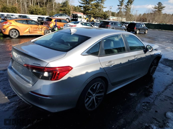 2024 Honda Civic Sedan Touring with VIN 2HGFE1F95RH325566, listed as a Copart auction lot 44560265 with 7,127 mi miles and Salvage Title. Bid and sale history available at carsss.com. Image 3.