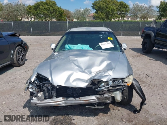 2002 Honda Accord LX z VIN JHMCG56462C005400, wystawiony jako IAAI lot #41893400 z przebiegiem Nie podano mil oraz . Historia ofert i sprzedaży dostępna na DreamBid. Obrazek 13.