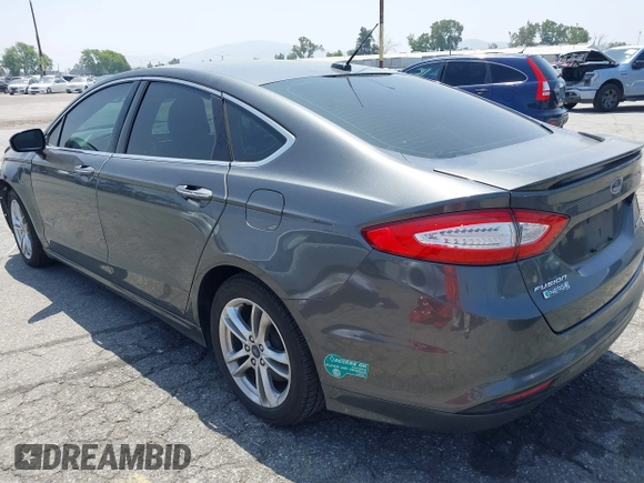 2016 Ford Fusion Titanium with VIN 3FA6P0SU1GR304590, listed as a IAAI auction lot 42381545 with 136,684 mi miles and . Bid and sale history available at DreamBid. Image 3.