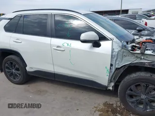 2022 Toyota RAV4 Hybrid SE with VIN 4T3T6RFV4NU065150, listed as a IAAI auction lot 42166772 with 69,868 mi miles and . Bid and sale history available at DreamBid. Image 14.