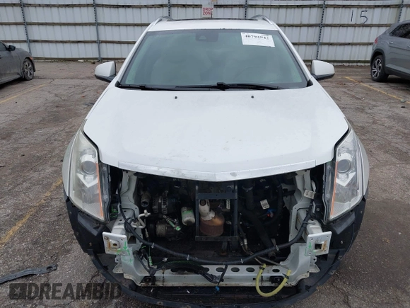 2014 Cadillac SRX Premium Collection z VIN 3GYFNDE34ES548826, wystawiony jako IAAI lot #40792942 z przebiegiem 115 984 mil mil oraz . Historia ofert i sprzedaży dostępna na DreamBid. Obrazek 13.