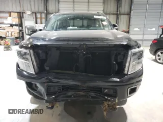 2017 Nissan Titan XD SL with VIN 1N6BA1F48HN561757, listed as a Copart auction lot 87204594 with 100,339 mi miles and Salvage Title. Bid and sale history available at carsss.com. Image 5.