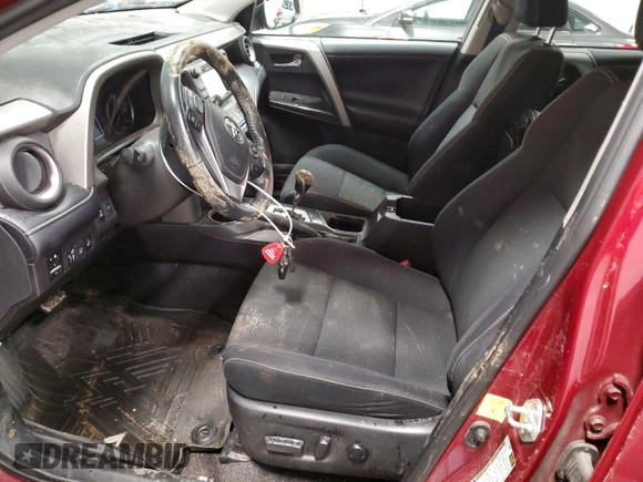 2018 Toyota RAV4 XLE with VIN 2T3RFREV1JW796091, listed as a Copart auction lot 49868845 with 71,878 mi miles and Salvage Title. Bid and sale history available at DreamBid. Image 7.