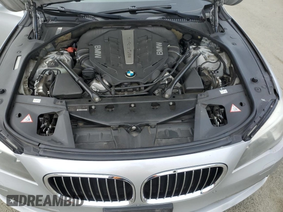 2013 BMW 7 Series 750i with VIN WBAYA8C57DC996498, listed as a Copart auction lot 52907415 with 109,405 mi miles and Salvage Title. Bid and sale history available at DreamBid. Image 11.