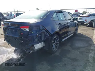 2021 Toyota Corolla SE with VIN 5YFP4MCE5MP082661, listed as a IAAI auction lot 41573579 with 58,418 mi miles and . Bid and sale history available at DreamBid. Image 4.