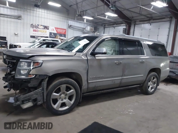 2018 Chevrolet Suburban Premier z VIN 1GNSKJKC9JR100134, wystawiony jako IAAI lot #41449255 z przebiegiem 111 528 mil mil oraz . Historia ofert i sprzedaży dostępna na DreamBid. Obrazek 14.