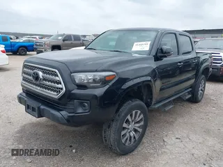 2017 Toyota Tacoma SR5 with VIN 5TFAZ5CN8HX052459, listed as a IAAI auction lot 41495281 with 212,314 mi miles and . Bid and sale history available at DreamBid. Image 20.