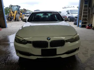 2013 BMW 3 Series 328i with VIN WBA3A5G52DNP18972, listed as a Copart auction lot 58122935 with 209,173 mi miles and Salvage title. Bid and sale history available at DreamBid. Image 6.