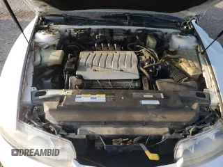 1997 Oldsmobile Aurora z VIN 1G3GR62CXV4124968, wystawiony jako Copart lot #69615474 z przebiegiem 249 895 mil mil oraz Nie do naprawy. Historia ofert i sprzedaży dostępna na DreamBid. Obrazek 11.