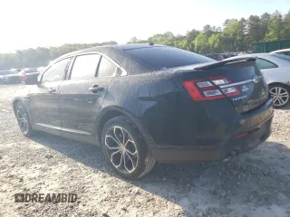 2014 Ford Taurus SHO with VIN 1FAHP2KT0EG181509, listed as a Copart auction lot 52615335 with 205,743 mi miles and Salvage title. Bid and sale history available at DreamBid. Image 2.