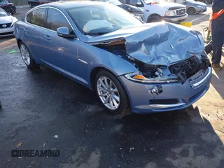 2013 Jaguar XF I4 RWD with VIN SAJWA0ES4DPS95992, listed as a IAAI auction lot 41248969 with 56,024 mi miles. Bid and sale history available at carsss.com. Image 1.