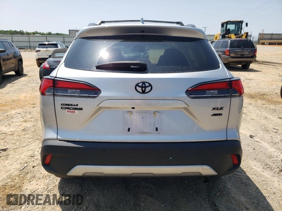 2023 Toyota Corolla Cross XLE с VIN 7MUDAABG6PV054981, выставлен на аукционе Copart как лот 59011125 с пробегом 32 254 миль миль и Списание • Salvage title. История ставок и продаж доступна на DreamBid. Изображение 6.