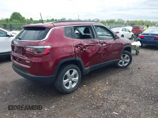 2021 Jeep Compass Latitude with VIN 3C4NJDBBXMT504993, listed as a IAAI auction lot 42181872 with 56,053 mi miles and . Bid and sale history available at DreamBid. Image 4.