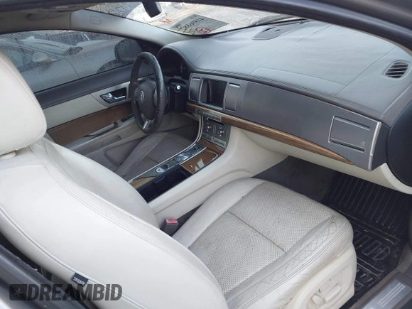 2009 Jaguar XF with VIN SAJWA07C991R01450, listed as a IAAI auction lot 41896882 with 163,857 mi miles and . Bid and sale history available at DreamBid. Image 5.