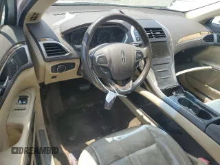 2015 Lincoln MKZ z VIN 3LN6L2G95FR626407, wystawiony jako Copart lot #63658825 z przebiegiem 121 361 mil mil oraz Szkoda całkowita • Salvage title. Historia ofert i sprzedaży dostępna na DreamBid. Obrazek 8.