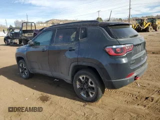 2018 Jeep Compass Trailhawk with VIN 3C4NJDDB9JT337597, listed as a Copart auction lot 86314244 with 88,873 mi miles and Salvage Title. Bid and sale history available at carsss.com. Image 2.