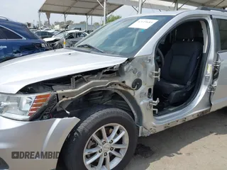 2013 Dodge Journey SXT with VIN 3C4PDCBG9DT506384, listed as a IAAI auction lot 42119685 with 143,769 mi miles. Bid and sale history available at carsss.com. Image 6.