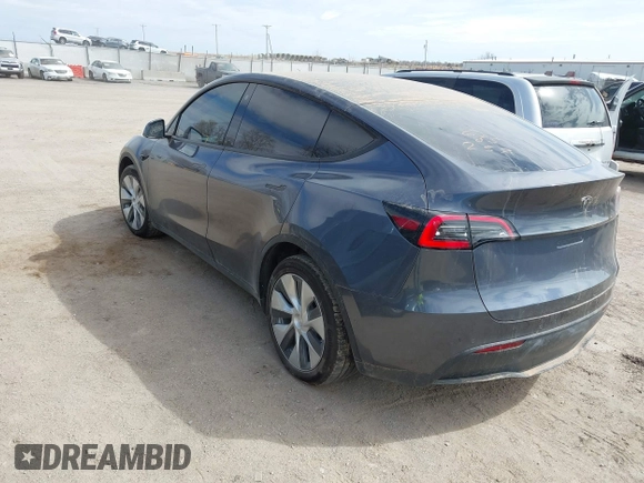 2022 Tesla Model Y Long Range with VIN 7SAYGDEE5NF534259, listed as a IAAI auction lot 41860246 with 24,513 mi miles and . Bid and sale history available at carsss.com. Image 3.