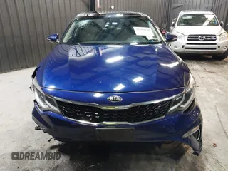 2019 Kia Optima LX z VIN 5XXGT4L37KG315026, wystawiony jako IAAI lot #42050820 z przebiegiem 148 579 mil mil oraz . Historia ofert i sprzedaży dostępna na DreamBid. Obrazek 13.