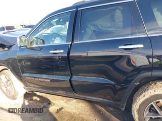 2021 Jeep Grand Cherokee 80th Anniversary with VIN 1C4RJFBG0MC801971, listed as a IAAI auction lot 41661098 with 31,961 mi miles and . Bid and sale history available at DreamBid. Image 14.