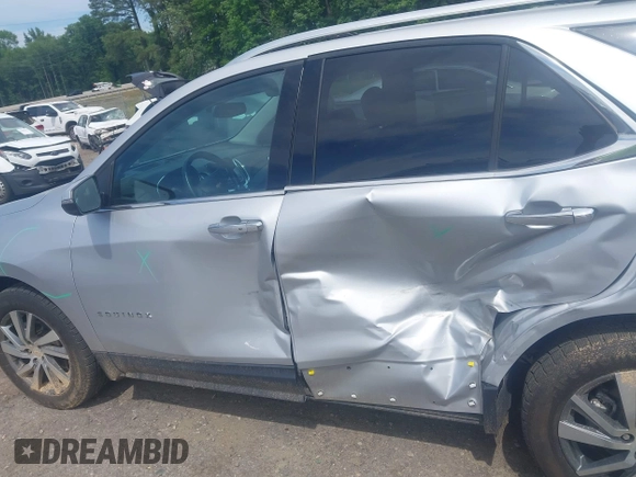 2022 Chevrolet Equinox Premier z VIN 2GNAXXEVXN6146327, wystawiony jako IAAI lot #42294870 z przebiegiem 68 276 mil mil oraz . Historia ofert i sprzedaży dostępna na DreamBid. Obrazek 14.