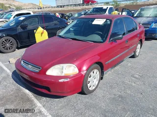 1998 Honda Civic LX with VIN 1HGEJ6671WL032443, listed as a IAAI auction lot 42086174 with 154,881 mi miles. Bid and sale history available at carsss.com. Image 2.