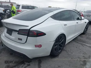 2022 Tesla Model S Plaid with VIN 5YJSA1E65NF488864, listed as a IAAI auction lot 41772788 with 33,915 mi miles and . Bid and sale history available at DreamBid. Image 4.