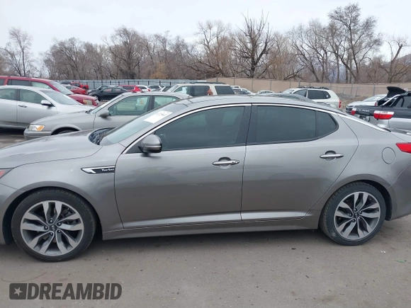 2014 Kia Optima SXL Turbo with VIN 5XXGR4A69EG312273, listed as a IAAI auction lot 41729863 with 107,660 mi miles and . Bid and sale history available at DreamBid. Image 14.