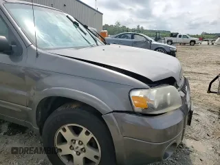 2005 Ford Escape Limited with VIN 1FMYU04115KA63383, listed as a Copart auction lot 59706164 with 212,167 mi miles and Salvage Title. Bid and sale history available at carsss.com. Image 10.