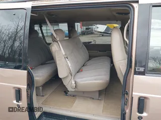 1998 Chevrolet Astro with VIN 1GNEL19W0WB198965, listed as a IAAI auction lot 41986890 with 107,881 mi miles. Bid and sale history available at carsss.com. Image 8.